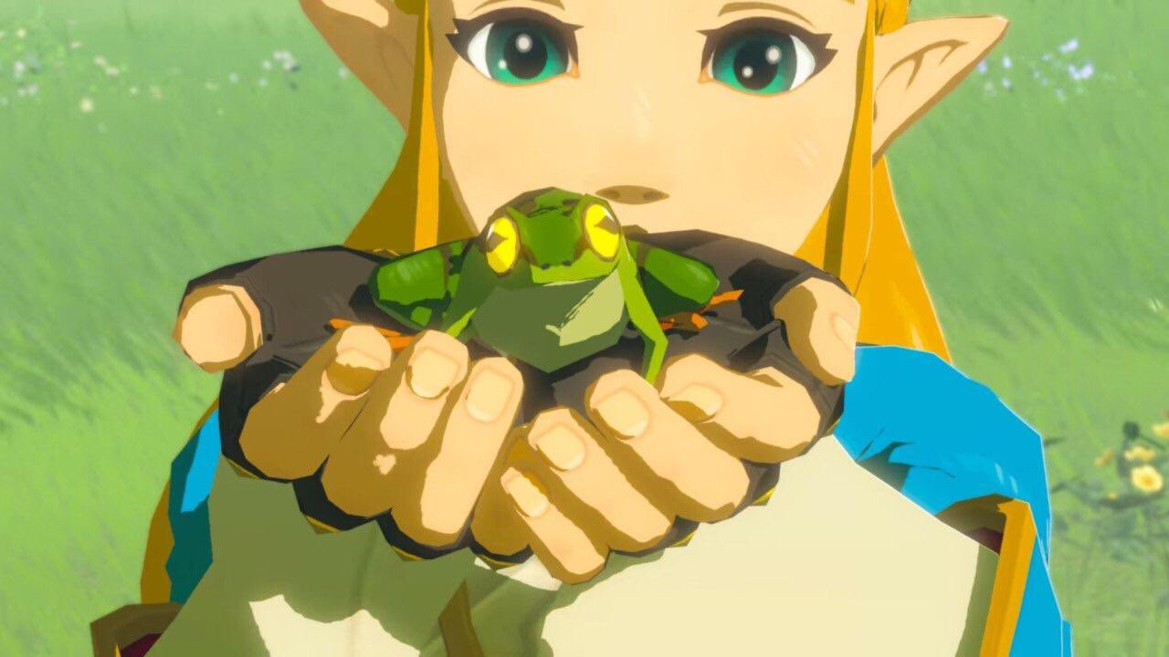 Zelda segurando o sapo, olha que fofo